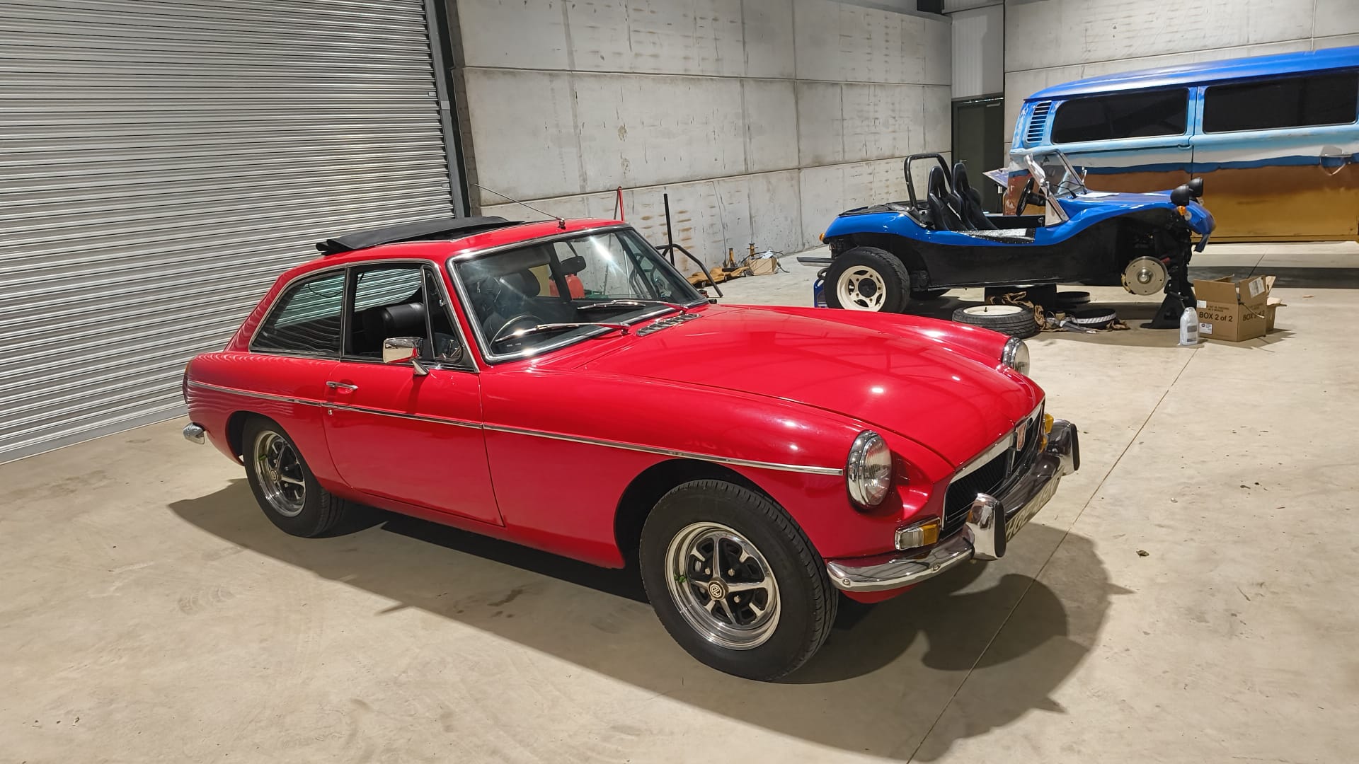 Red MG GT in our classic car workshop